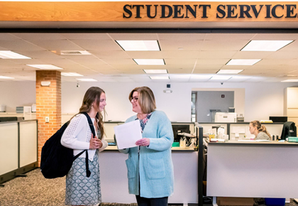 Student Services team member assisting a student.